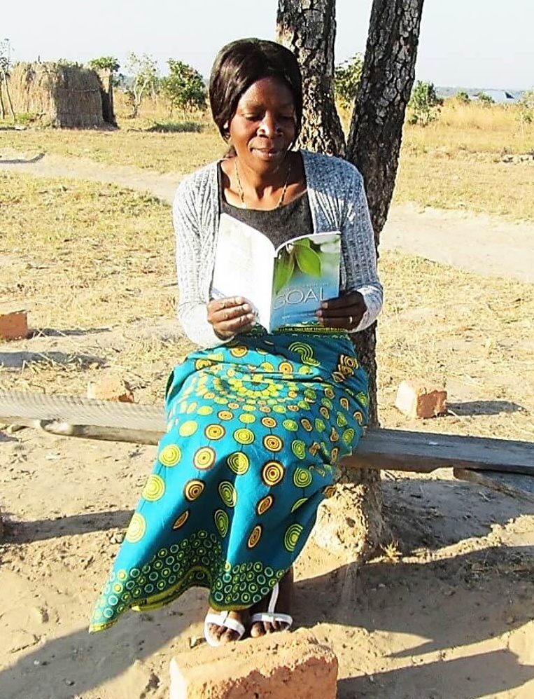 Elizabeth reading her materials.