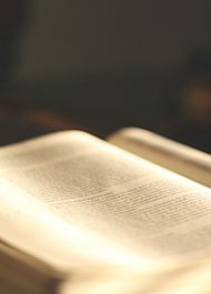 A Bible opened with a dark background