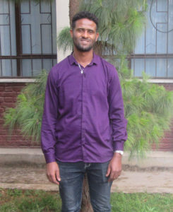 Efrem Standing The Bible League Ethiopia Office