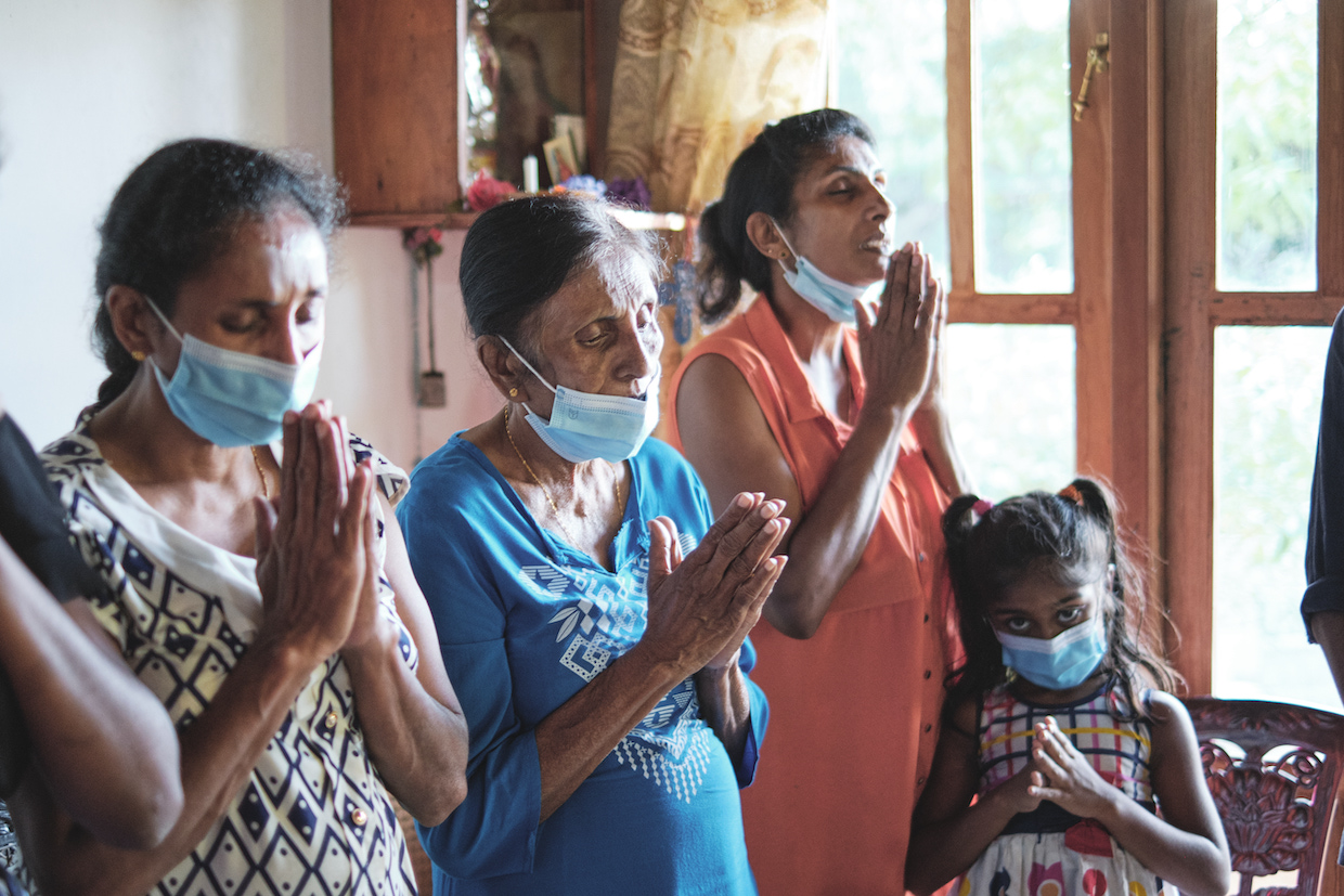 Ladies Praying During Bible Study Meeting In The House Of Chaminda's Sister.