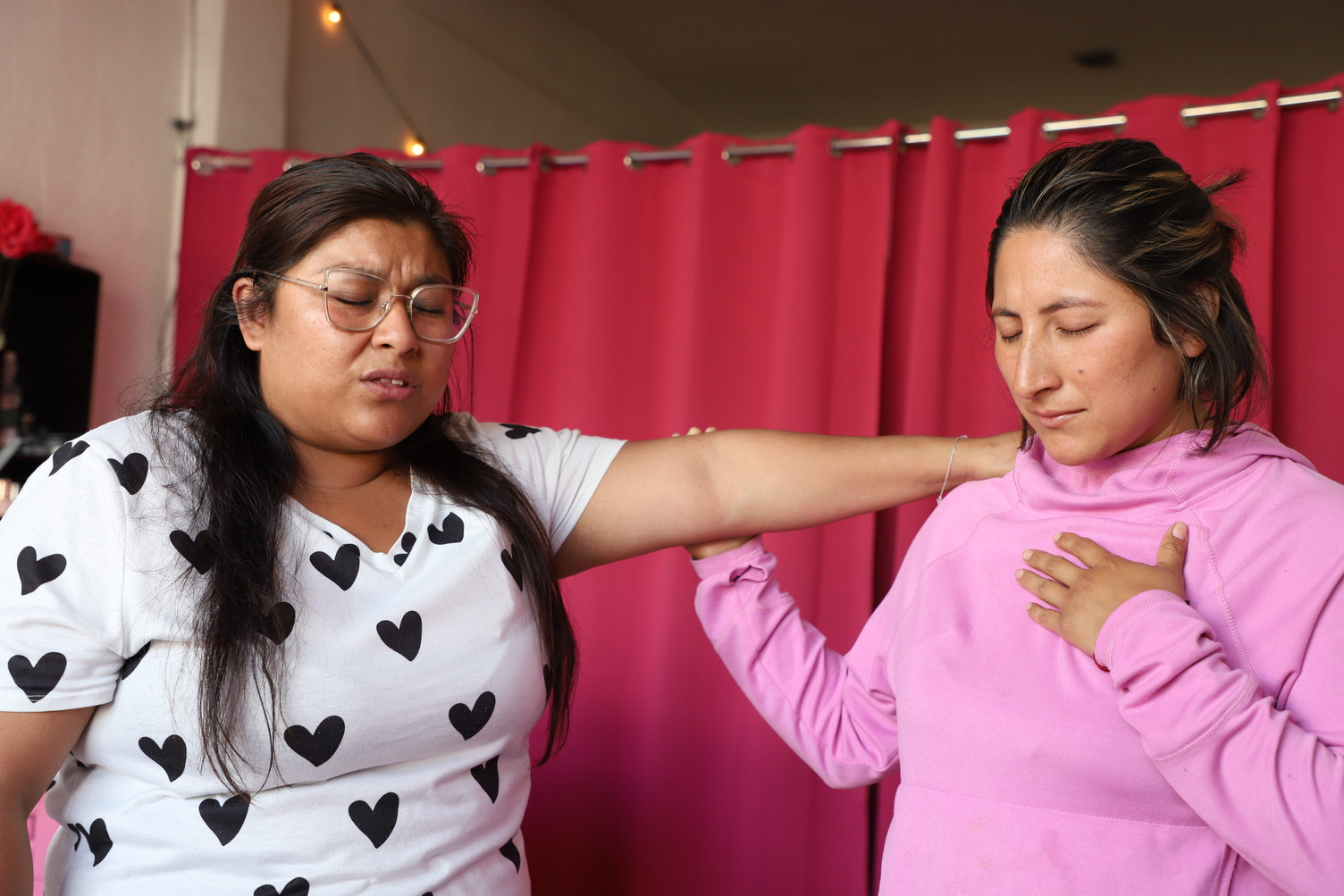 Tania and Jacqueline praying