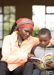 Brian (right) Reading His Bible With His Mother Copy